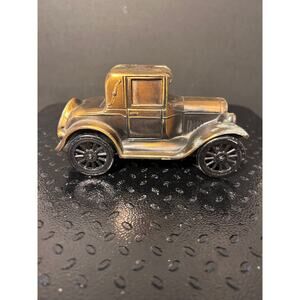 vintage Banthrico Inc. coin bank modeled after a 1926 Pontiac Coupe.